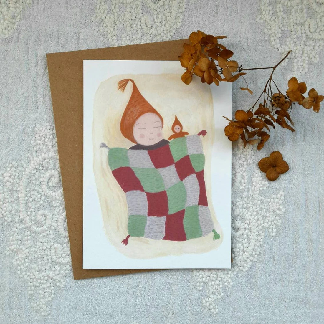 Child In Blanket Greeting Card