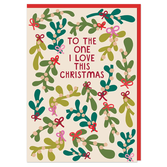 Christmas card with mistletoe design and text 'To the one I love this Christmas' on a beige background.